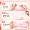 Hands kneading, blowing bubbles, and stretching a pink crystal clear stress relief slime.