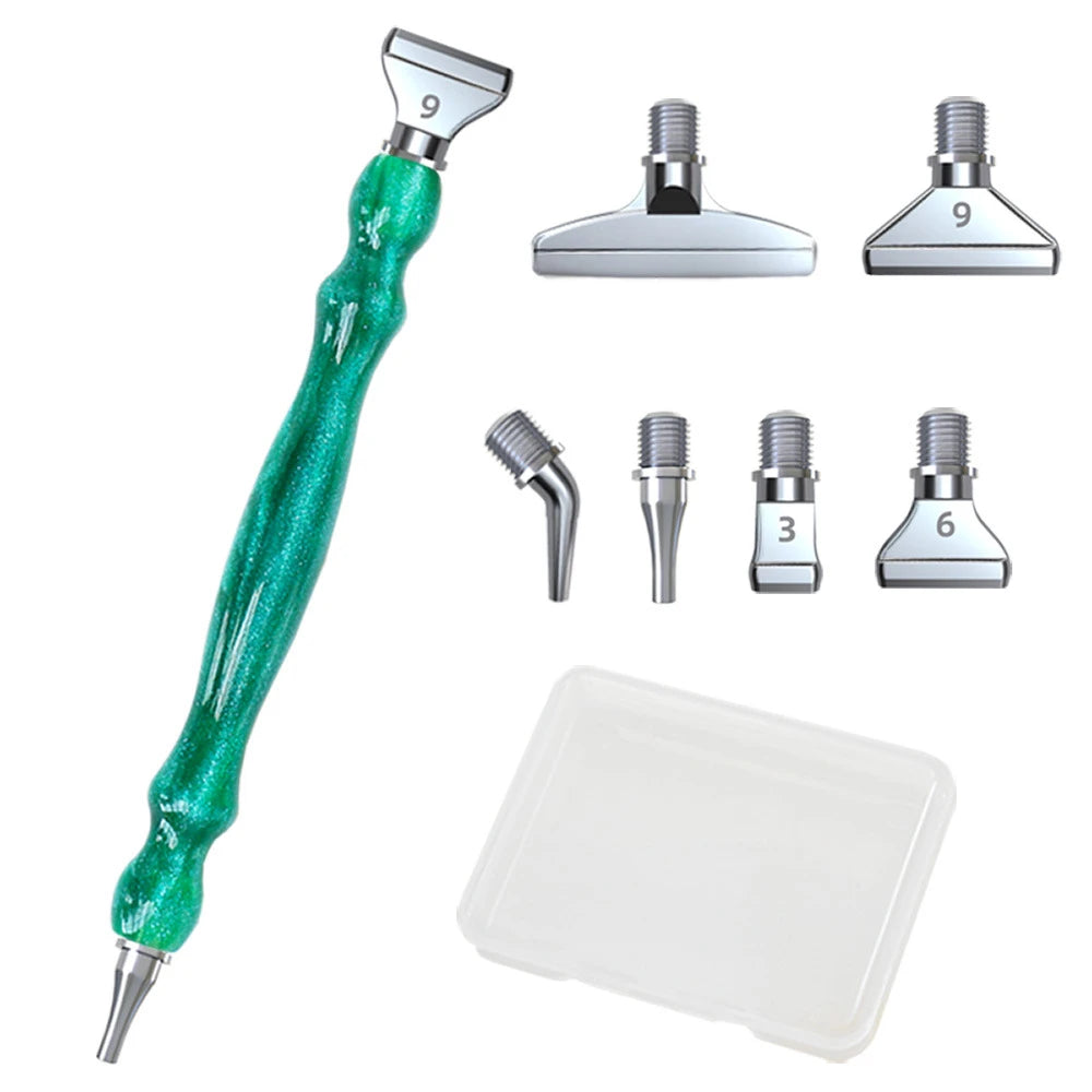 A set of resin diamond painting pens with various threaded dotting tips and a clear plastic tray