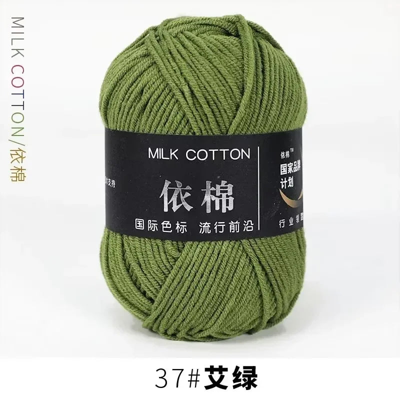 A ball of olive green milk cotton yarn labeled with Chinese characters and a thread count of 37