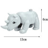 A white elephant building block set with a long trunk and large ears, shown from the side.