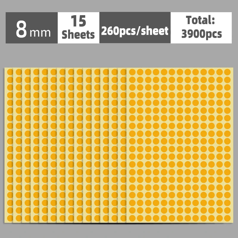 A sheet of round, yellow self-adhesive dot labels with a light orange background.