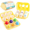 A set of colorful egg-shaped learning puzzles for toddlers, including plastic eggs and a yellow tray.