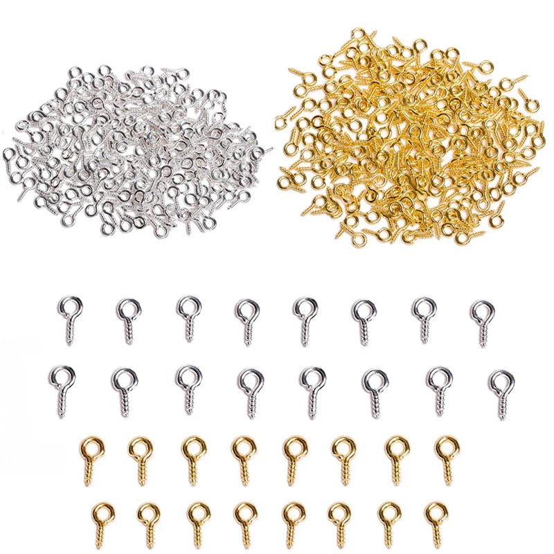 A collection of silver and gold metal eye pins for jewelry making and DIY crafts.