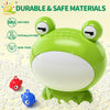 A bright green plastic frog toy is shown with small plastic fish scattered around it.