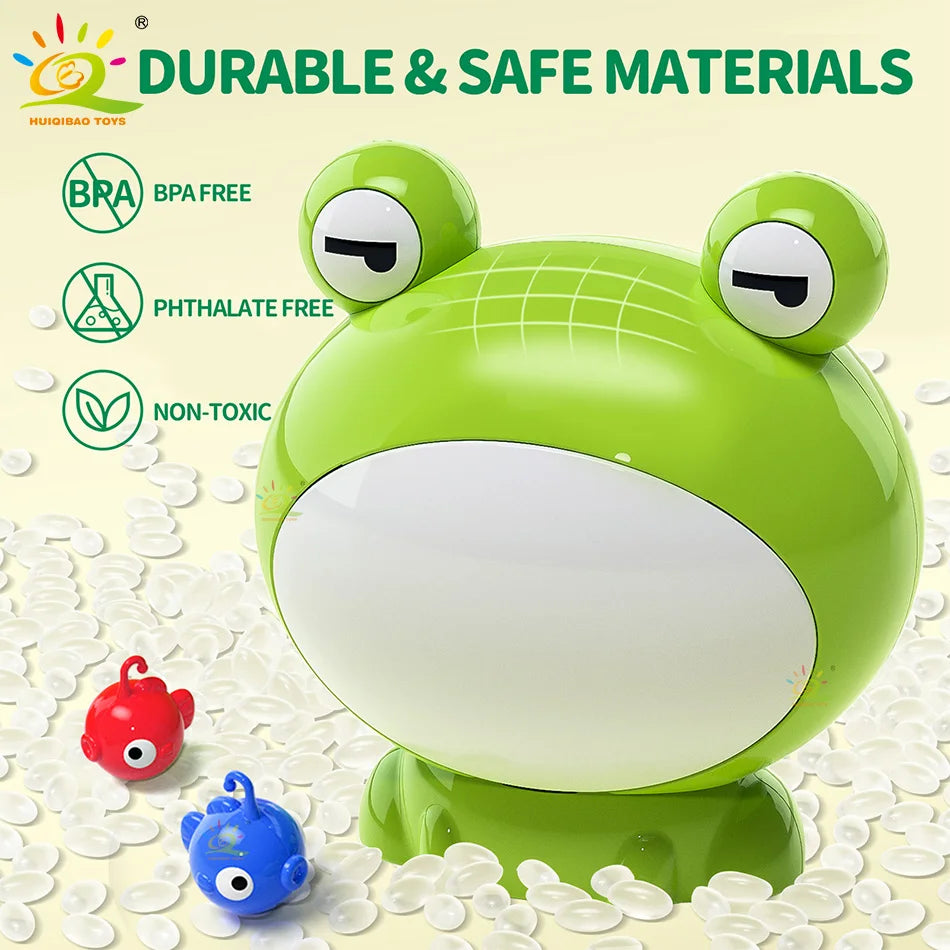 A bright green plastic frog toy is shown with small plastic fish scattered around it.
