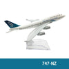 Diecast model of an Air New Zealand Boeing aircraft in white and blue livery.