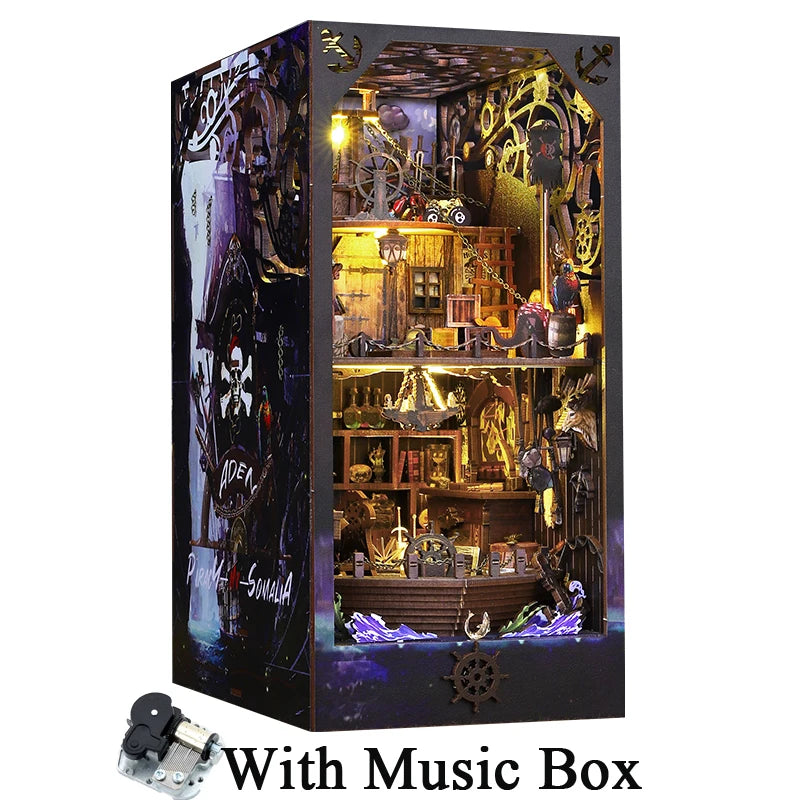 A dark wooden box containing a detailed pirate ship book nook model with an included music box.