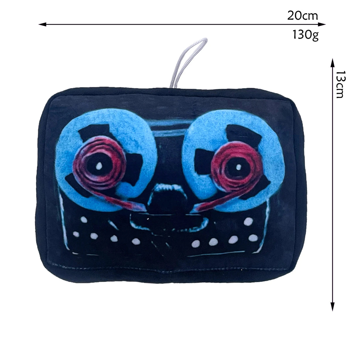 A dark blue plush toy resembling a stylized face with large circular eyes and a black body.