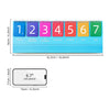 A set of seven colored flash cards showing the numbers one through seven for place value learning.
