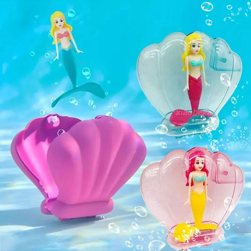 A collection of pink and clear mermaid dive toys featuring a mermaid figure inside an opening shell.