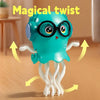 A teal, squid-like toy with large black glasses and tentacles is shown in a close-up against a light background.