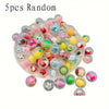 A pile of 5 random kawaii mini capsule figures in various colors and designs.
