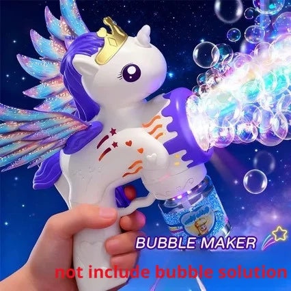 A hand holds a white unicorn-shaped bubble maker gun with purple accents and colorful light effects against a dark blue backg