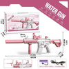 A pink electric water gun toy rifle with a long barrel and stock, shown next to its packaging and battery details.
