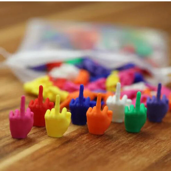 A collection of colorful 3D printed hand gesture desk ornaments in various bright colors.