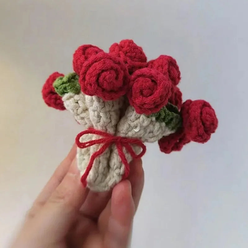 Hand-crocheted red and white lily of the valley coasters with green accents