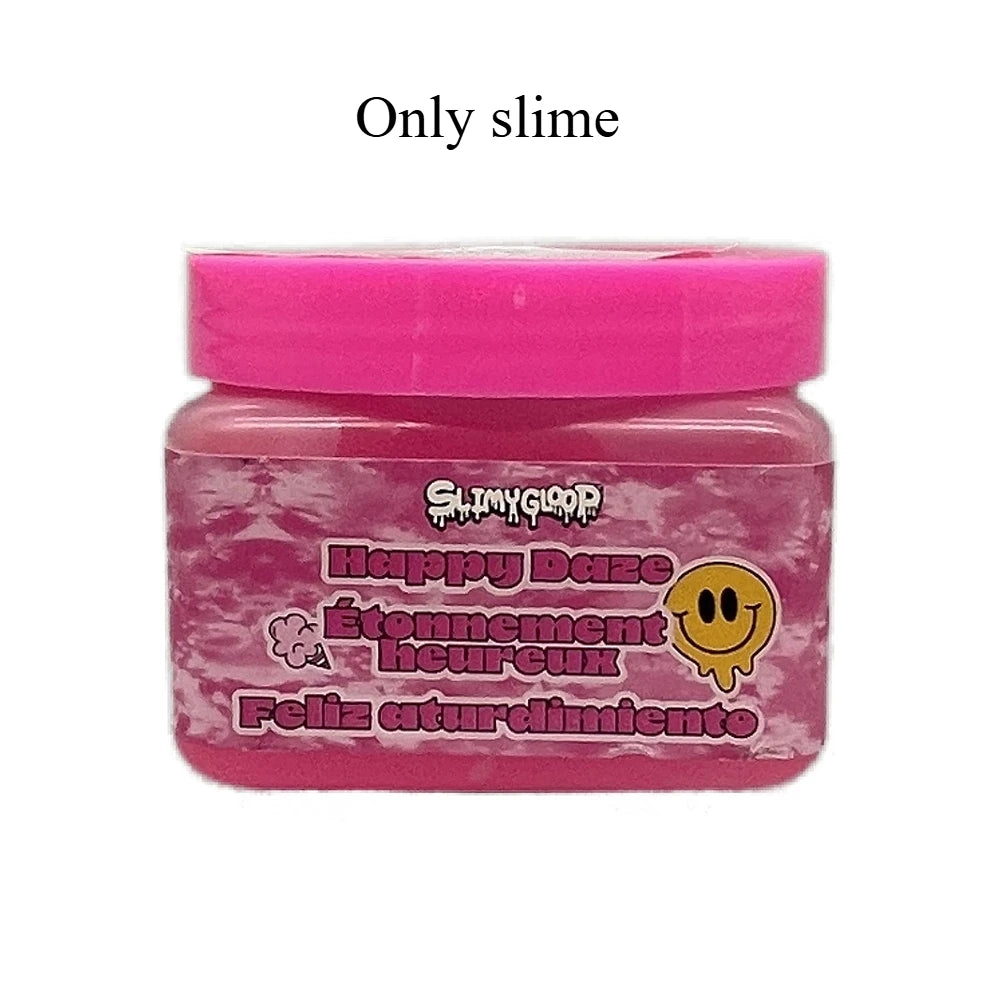 A pink jar of slime labeled Happy Daze Étonnement Heureux Feliz aturlimiento