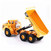 A yellow 1:87 scale articulated dumper truck diecast model with a large orange dump bed.