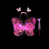A pink LED butterfly costume set for girls featuring glowing wings, a skirt, and a wand.