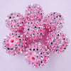 A cluster of ten pink and silver glitter resin beads for jewelry making
