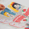 A collection of colorful DTF transfer film sheets featuring cute cartoon characters and designs.