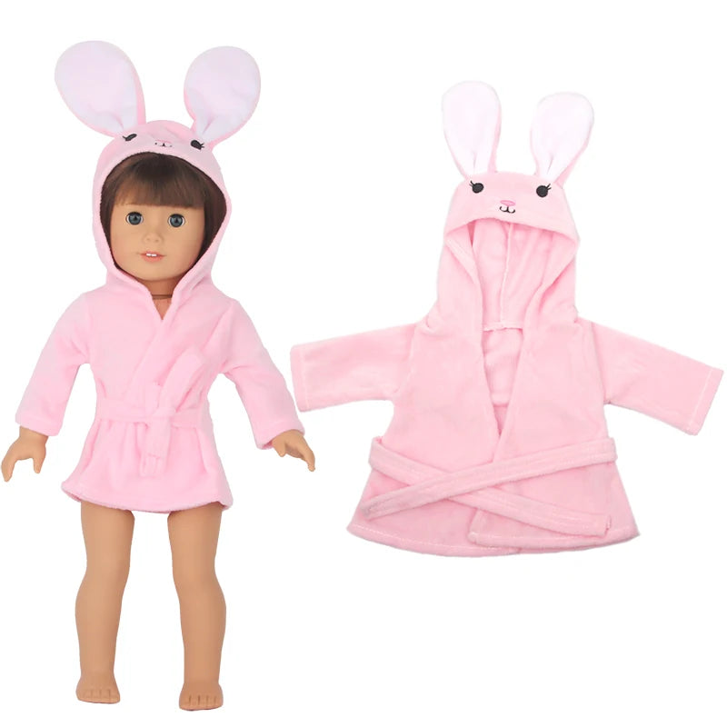 A pink cartoon animal bathrobe and nightgown set for a doll