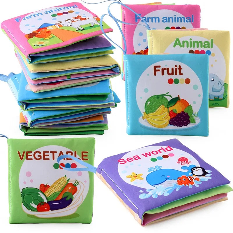 A collection of soft cloth books featuring various animals, fruits, and vegetables for babies.