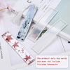Several flexible silicone molds for resin bookmarks are displayed on a white background.