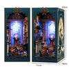 A wooden book nook kit featuring a detailed interior scene with warm LED lighting and decorative elements.