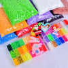 A collection of colorful DIY mini bead sets with templates and keychain accessories in various shades of green, orange, purpl