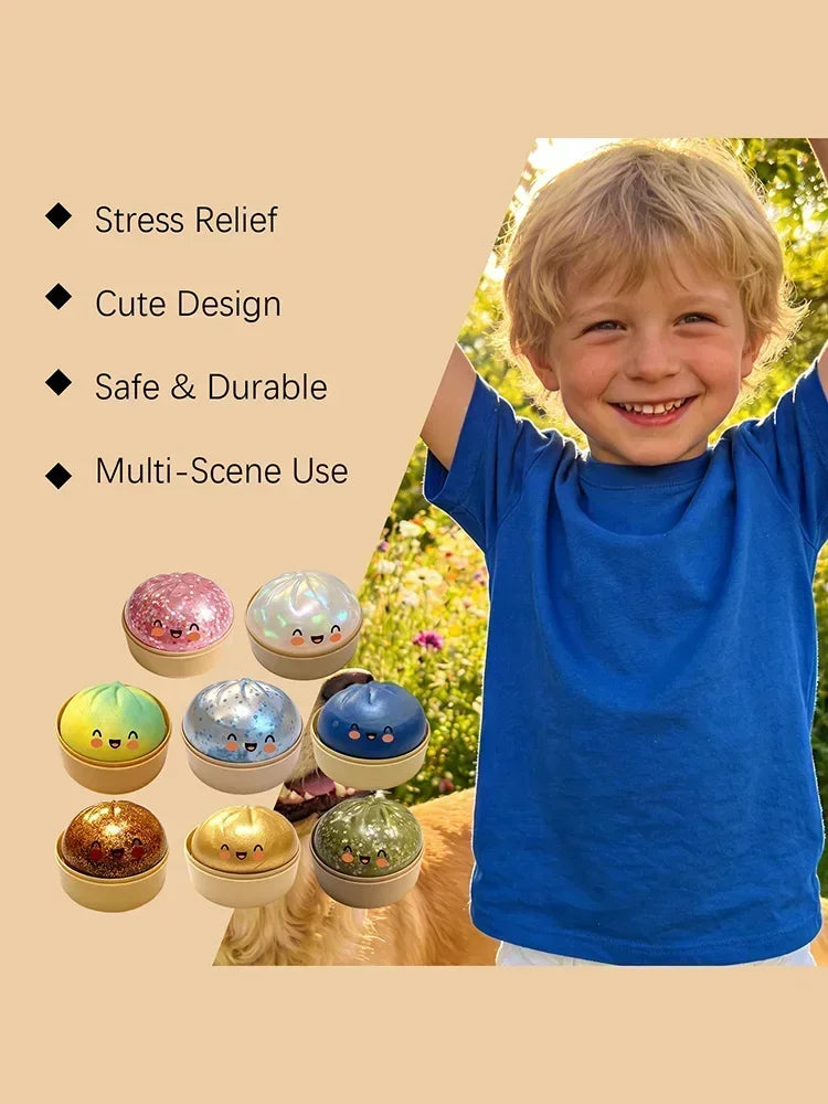 A smiling young boy holds a colorful squishy dumpling stress relief toy in his hand.
