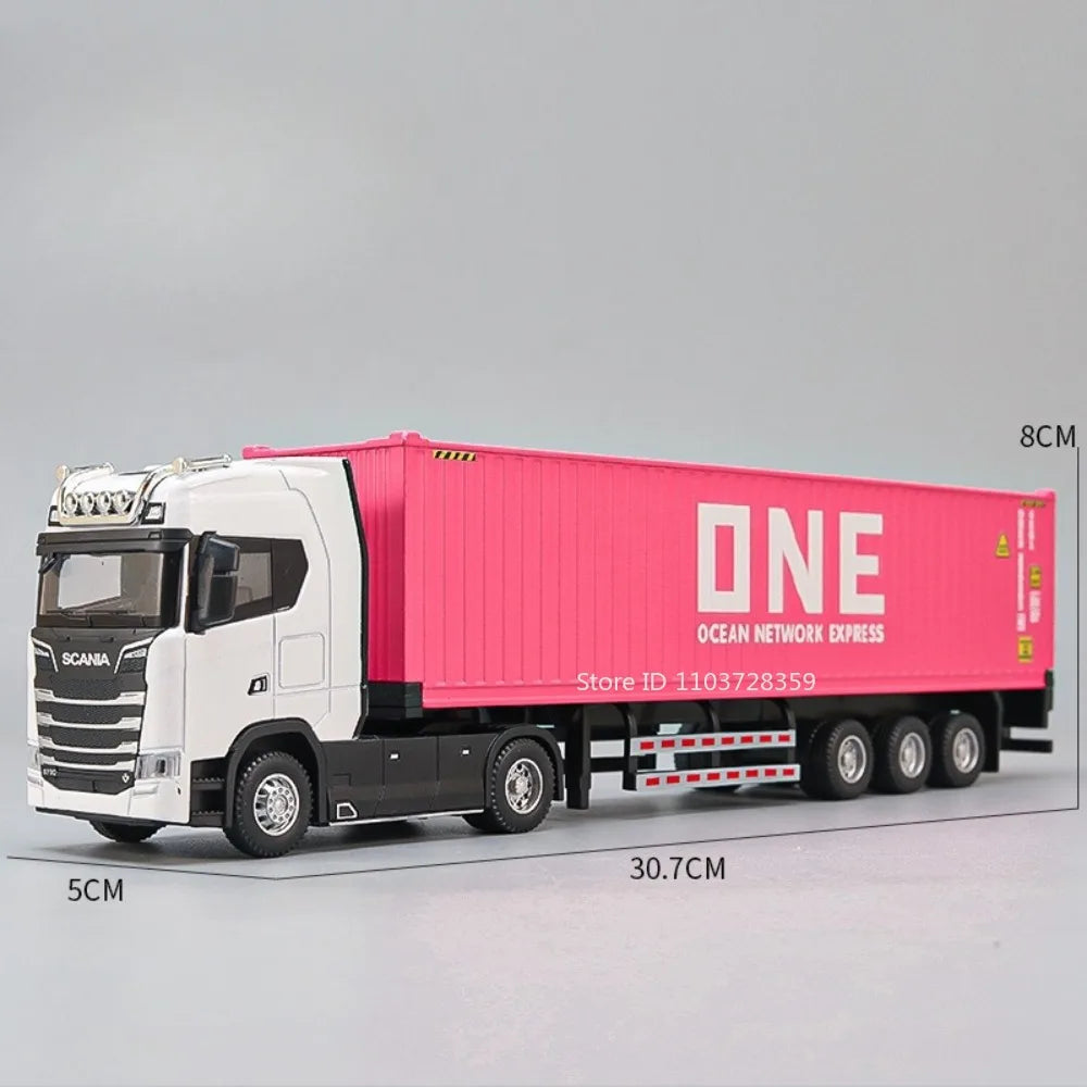 A pink container truck model with a white cab and black chassis, featuring details like wheels and lights.