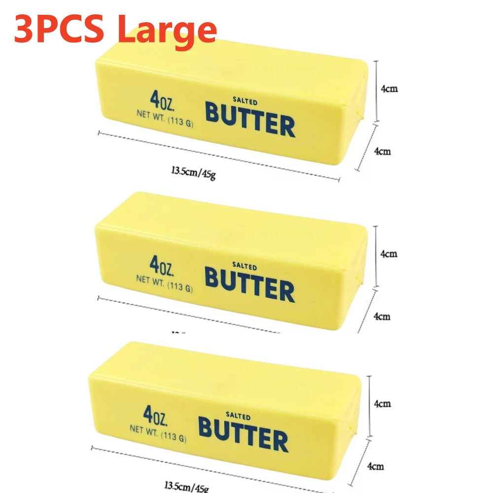 Three large yellow butter sticks for fidget toys, each labeled 4oz salted butter.