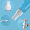Three refillable travel spray bottles with fine mist pumps shown in various angles.