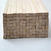A stack of natural solid wood strips for DIY crafts and model building, showing various thicknesses.