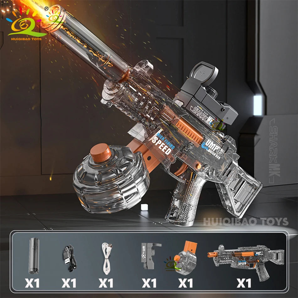 A clear plastic automatic electric UMP45 water blaster rifle is shown firing a stream of water in a dark setting.