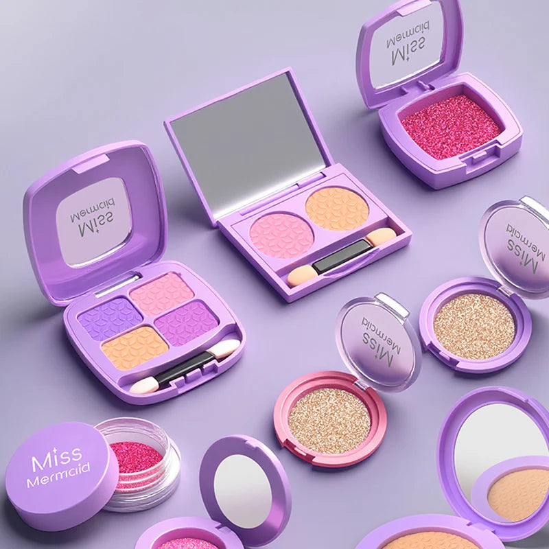 A collection of purple and pink cosmetic products including palettes, compacts, and loose powder in an open case.