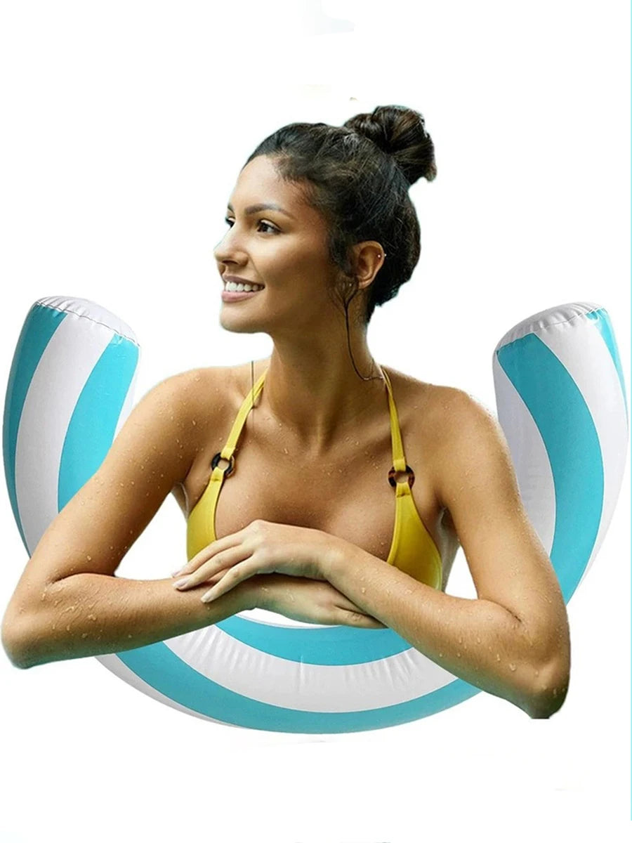 A woman wearing a yellow bikini is relaxing on a blue and white striped inflatable U-shaped pool float.