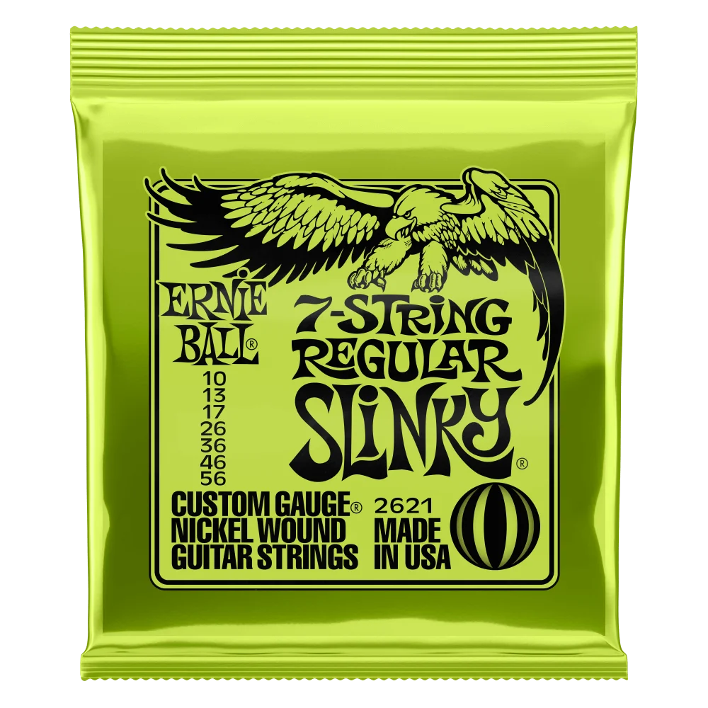 A yellow foil package of Ernie Ball Slinky regular guitar strings featuring an eagle graphic.