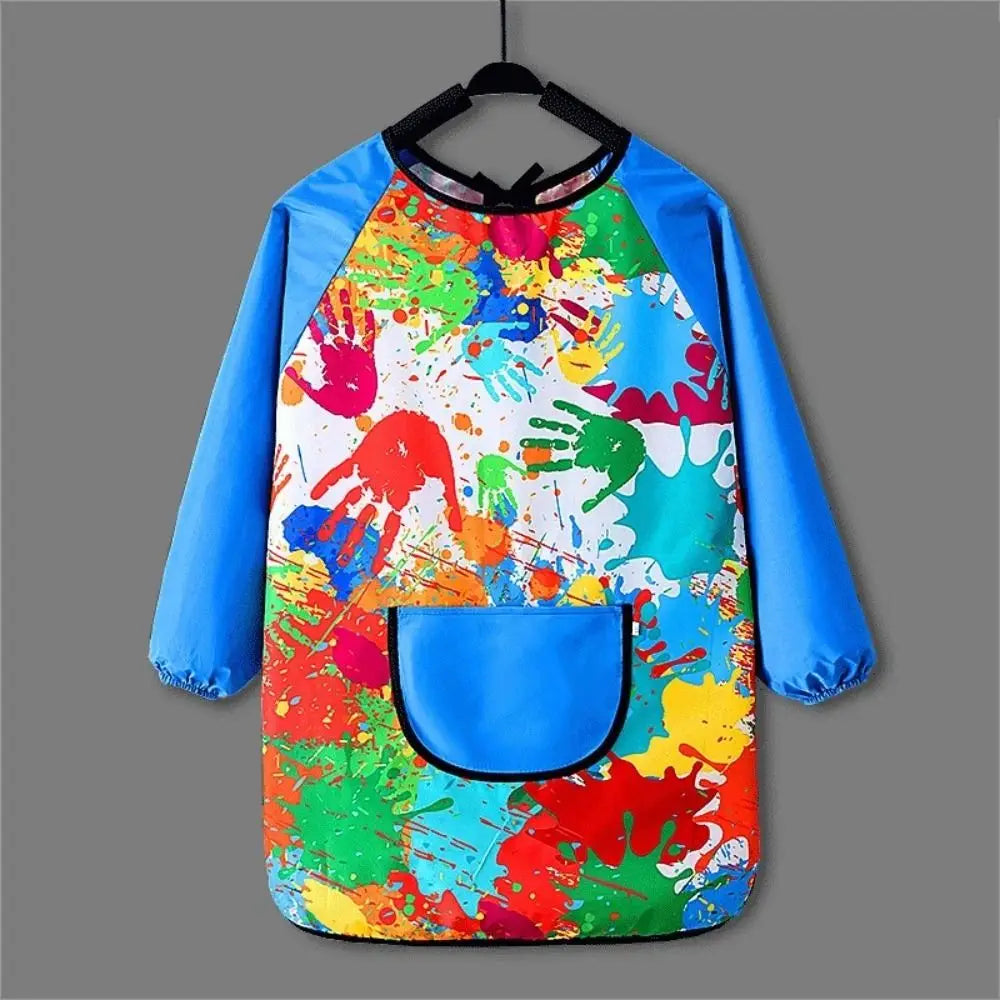 Kids waterproof long-sleeve art smock and dining bib featuring colorful paint splatters