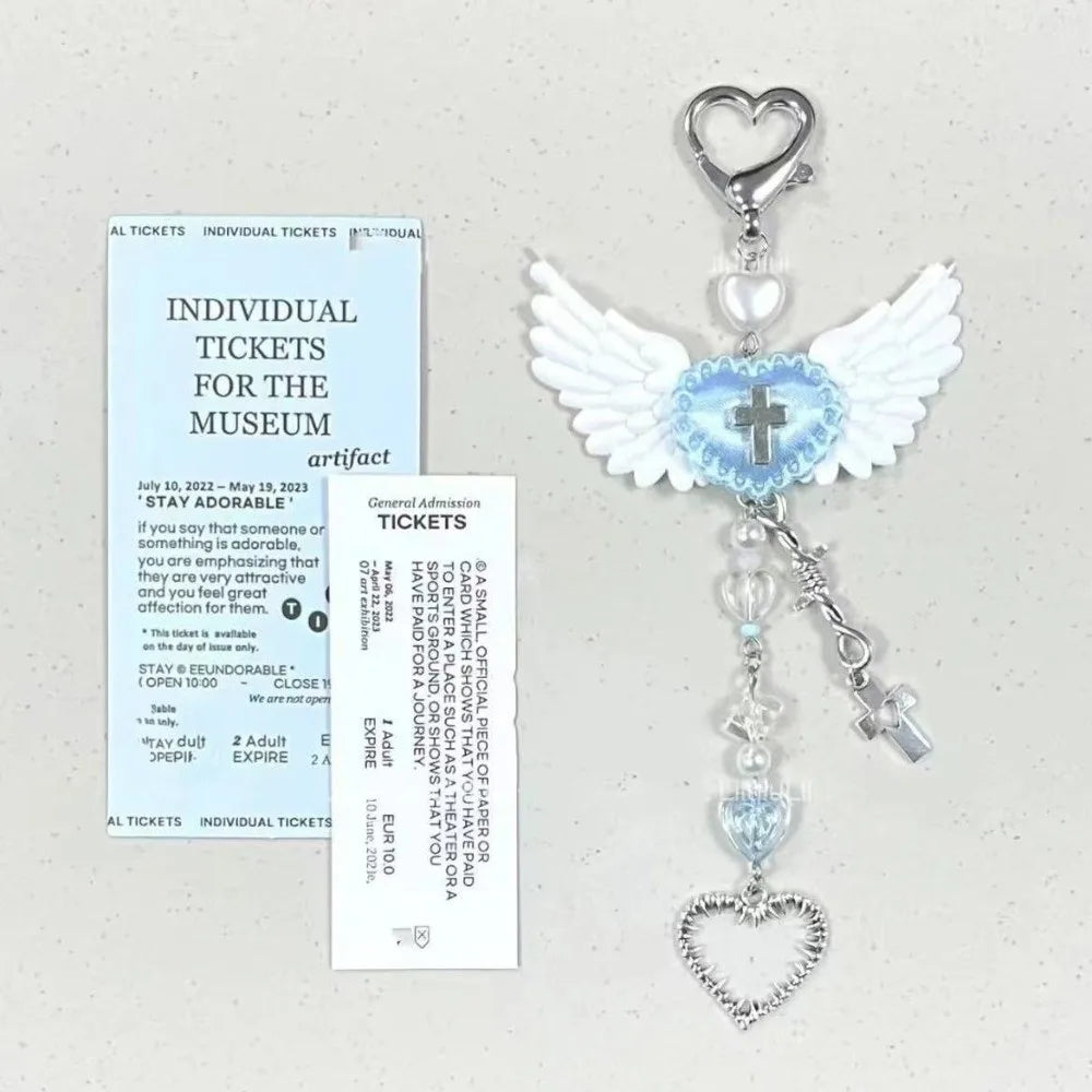 Silver beaded wing cross phone lanyard keychain with a heart pendant