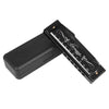 A black harmonica with ten holes and a key is shown from the side.