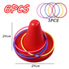 A red balance stepping stone toy with colorful rings, shown from above and below.