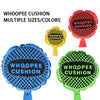 Various sizes and colors of Whoopee cushions displayed on a white background.
