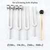 Set of four tuning forks displaying different frequencies: 128hz, 136.1hz, 256hz, and 384hz.