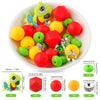 A white bowl filled with various colored silicone beads shaped like cartoon animals for DIY jewelry making