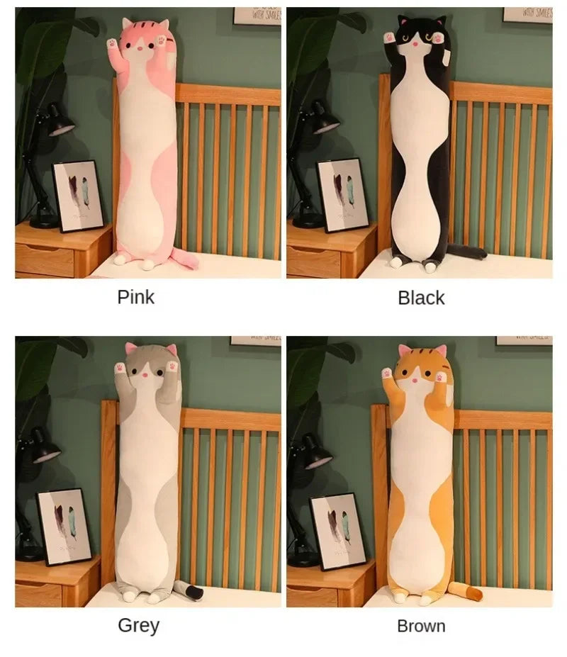 Four plush cat pillows in Pink, Black, Grey, and Brown displayed against a wooden background.