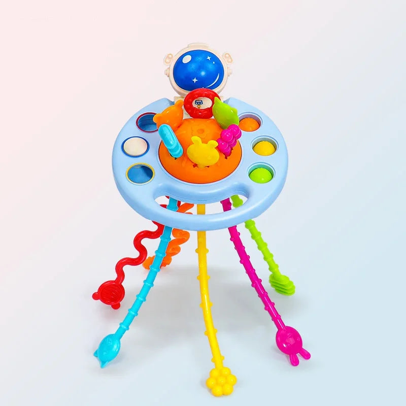 Juguete de sonajero para masticar de silicona con bolas de colores y cuerdas colgantes.