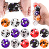 A collection of squishy stress balls featuring Halloween themes like pumpkins, ghosts, and skulls in various colors.