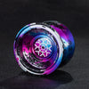 A close-up of a professional aluminum alloy yo-yo with high-speed ball bearings, featuring iridescent purple and blue finishe